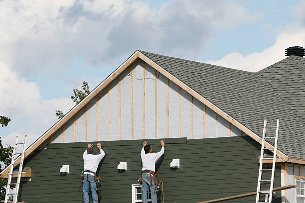 Professional Siding technician working in Boxford, MA